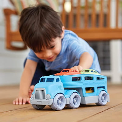 green toys car carrier vehicle